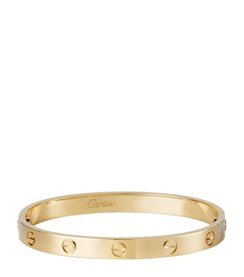 cartier love bracelet yellow gold|Cartier gold bracelet with screws.